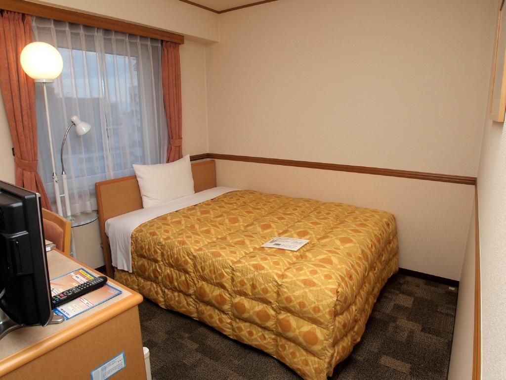 Toyoko Inn Hokkaido Asahikawa Ekimae Ichijo Dori Exterior photo